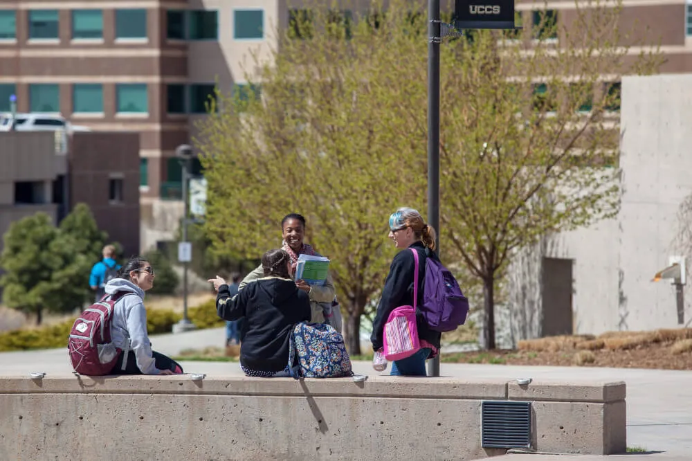 A group of students hanging out on campus.